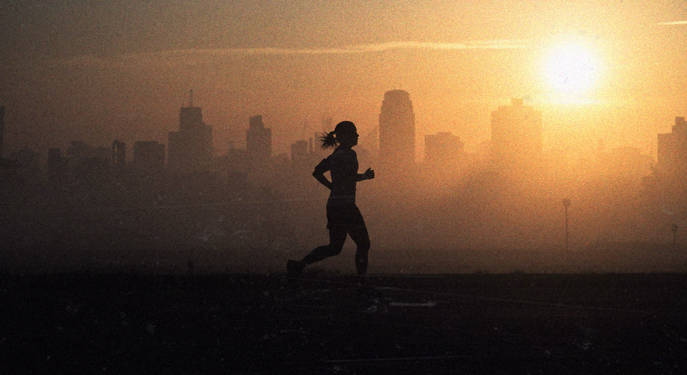 A silhouetted female runner sprints against a golden sunrise backdrop with a city skyline, symbolizing explosive speed and athletic training. - heatseekerproject.com
